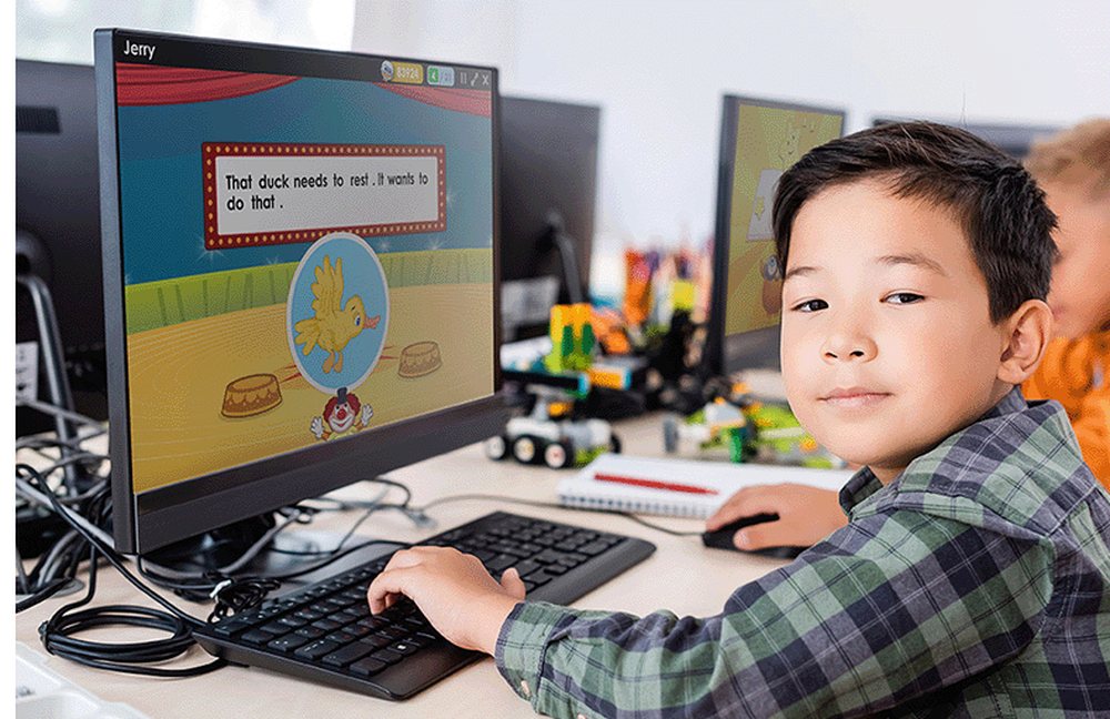 A boy reading and building words with Reading Kingdom